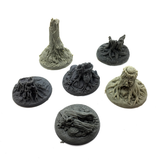 A set of six tree stumps by Legend Games