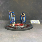 Reaper Miniatures figure77351 Cultists and Circle painted by Mrs MLG. This is the cultists and circle set painted and made into a diorama using blood effect and a monster hand