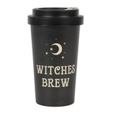 travel mug in a stippled black colour with a crescent moon and star design and the words 'Witches Brew', topped with a black lid. 