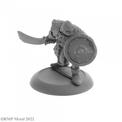 Orc Fighter from the Dark Heaven Legends metal range by Reaper Miniatures sculpted by Bobby Jackson. A great orc fantasy miniature for your RPG adventure with a sword in one hand and a round shield in the other. 