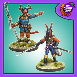 Tiefling Pirates by Bad Squiddo sculpted by Shane Hoyle. This pack of two female tielfing could be used in a variety of ways on your gaming table and in your RPG, one holds a sword unsheathed out to the side and wears a cape, the other is pointing with one hand and has a halberd in the other.