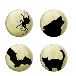 A pack of four badges each with a different silhouette design. A spider, wolf, bat and cat in silhouette form against a green grey mottled background as if they are against the moon