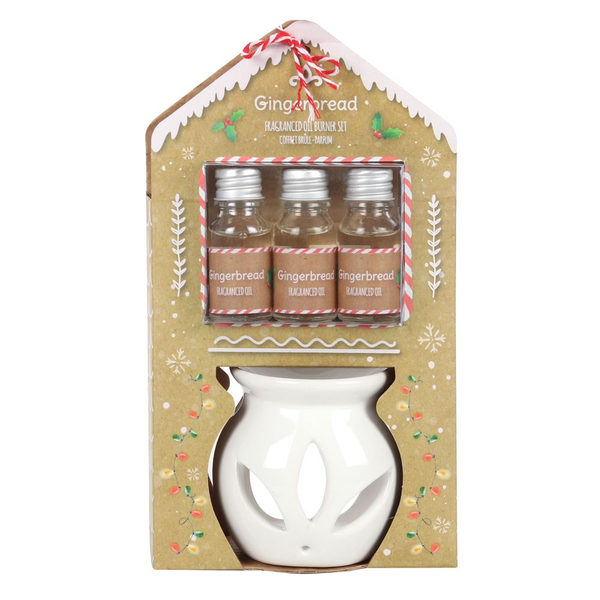 box set contains a white ceramic oil burner with stylised flower pattern and three bottles of sweet gingerbread fragrance oil. 