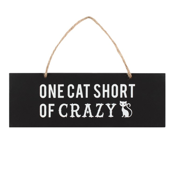  Black sign with white writing saying 'One Cat Short Of Crazy'