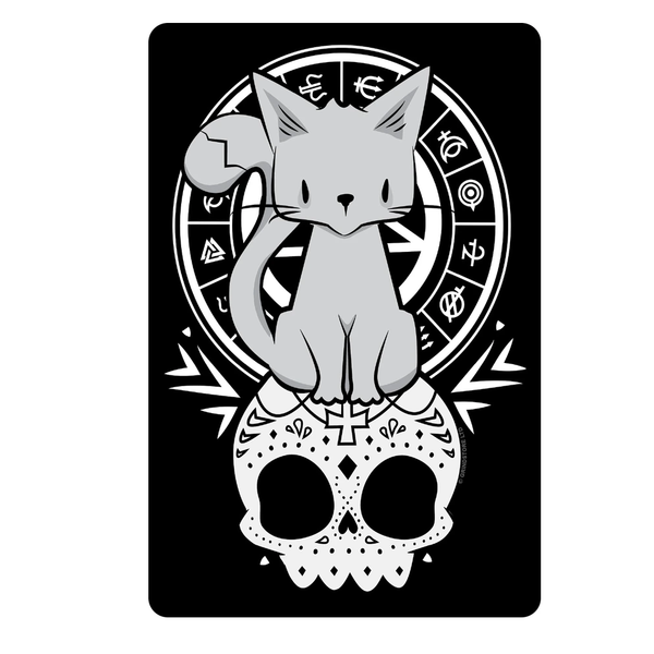 A black tin sign with adorable grey kitten sitting atop a white sugar skull with symbols behind