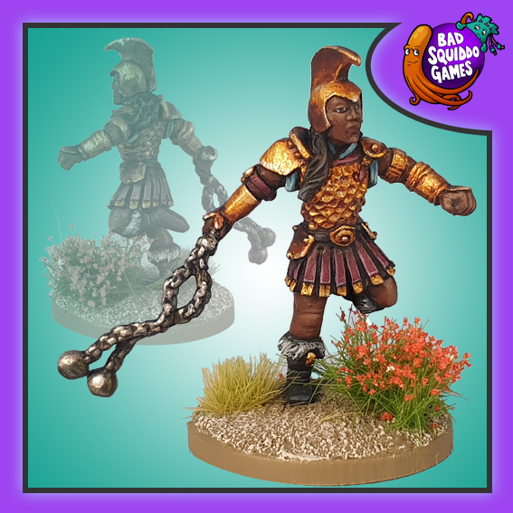 Bad Squiddo Games metal gaming figure. running stance with her weapon out to her side ready to be used. 