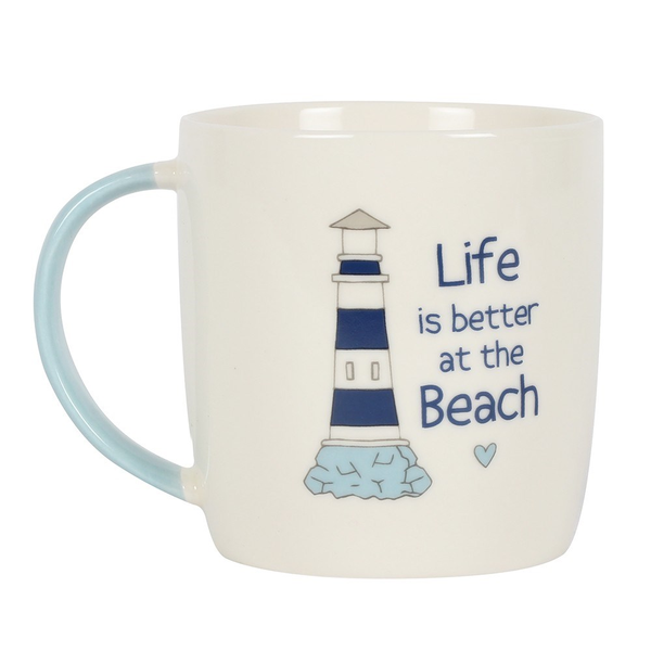 A pretty nautical themed mug with a white and blue pallet of colours, a lighthouse image and the words 'Life is better at the beach'