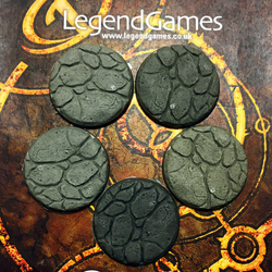 A pack of 40mm round natural stone bases by Legend Games 