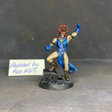 A sorcerer painted by Mrs MLG. This resin printed miniature is in the style of the hero quest sorcerer, painted with blue clothing and red headdress.  