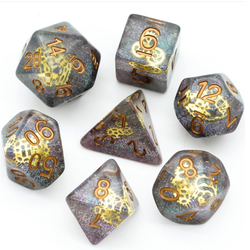 gem poly dice have blue and purple glitter detail with golden cogs inside each one and gold numbers.