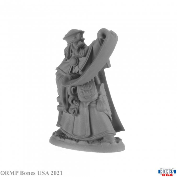 REaper Miniatures 30007 Damras Deveril Wizard. a male wizard dressed in robes, with a beard, wearing a hat and reading out from a scroll. 