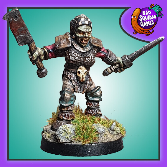 Mog Orc Warrior by Bad Squiddo sculpted by Phil Hynes, a great edition to your gaming table, diorama and more this Orc warrior holds a blade in one hand and a cleaver style weapon in the other
