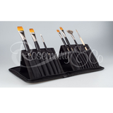 A Rosemary & Co brush case. This black case has the Rosemary & Co logo in white on the front, a zip fastening and six dividers for large brushes and nine dividers for smaller brushes. 