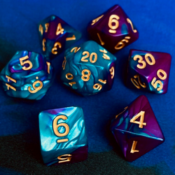 Elemental Purple Blue RPG D20 dice set. Elemental two-tone dice with swirls of glorious teal and rich purple with gold numbers