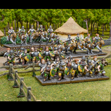 Halfling Battlegroup for Kings of War. Miniatures shown painted and assembled in fighting lines on a grassed battleboard.