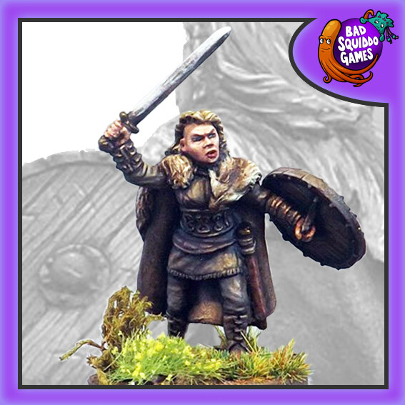 Thorrun, Shieldmaiden Champion holds a shield in one hand and a sword in the other, a great edition to your dark ages gaming table. 