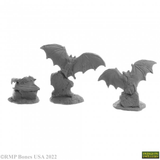 A pack of 3 Giant Bats from the Bones USA Dungeons Dwellers range by Reaper Miniatures. This pack contains three plastic bats in various poses on gravestones, two have their wings outstretched