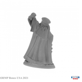 REaper Miniatures 30007 Damras Deveril Wizard. a male wizard dressed in robes, with a beard, wearing a hat and reading out from a scroll. this image is the back of the wizard and shows his cape