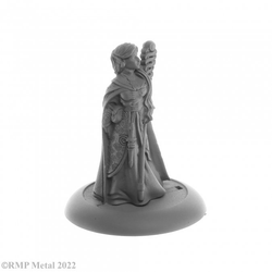 Anthanelle Female Elf Wizard from the Dark Heaven Legends metal range by Reaper Miniatures, wearing a robe and holding an ornate staff in one hand and the other by her side Anthanelle strikes a regal pose 