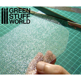 Calm Water Textured Sheet by Green Stuff World being held and cut