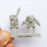 Ugruk-tar Goblin Mercenaries v.4 by spellcrow. 2 Goblins one holding a large sword in both hands and the other with a hand dagger in each hand ready for a fight. shown being held in a hand