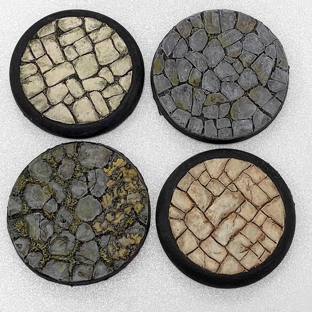 A pack of six lipped resin flagstone 50mm bases by Legend Games for your tabletop gaming needs. 