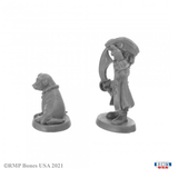 Reaper miniatures Skipper and Scuttle 30049. kipper and Scuttle are a cheeky pair of pirate pals comprising of a seal with a compass around its neck and a pirate holding a sword in one hand and a saluting style sign with the other hand on his hat. 