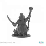 Arkus Harn dwarf witch hunter reaper miniatures 30011. sword in one hand and a staff in the other he stand with one foot aloft on a recently slain creature.