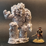 Nature Elemental by Bad Squiddo Games is sculpted by Ristul and would make a great elemental for your gaming table. Approximately 76mm from the toe to the top of its head and comes in four pieces. An earth elemental in a tree style made from resin.  Shown with a human miniature next to it