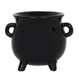 A black cauldron design oil burner with cut out star designs