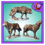 Metal gaming miniatures from Bad Squiddo Games. One wolf is standing with its head in a howling position, one is stood as if it has spotted its pray and the other has its head lower, snarling as if warning your adventuring party not to approach any closer.  