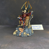Dragoth pre painted by Mrs MLG. Dragoth sat on his throne with one hand on his sword, his throne is made from bones and skin 