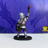 back view of the MLG Mascot Mini, Sir Lance, painted metal miniature of a knight holding a paintbrush high up.