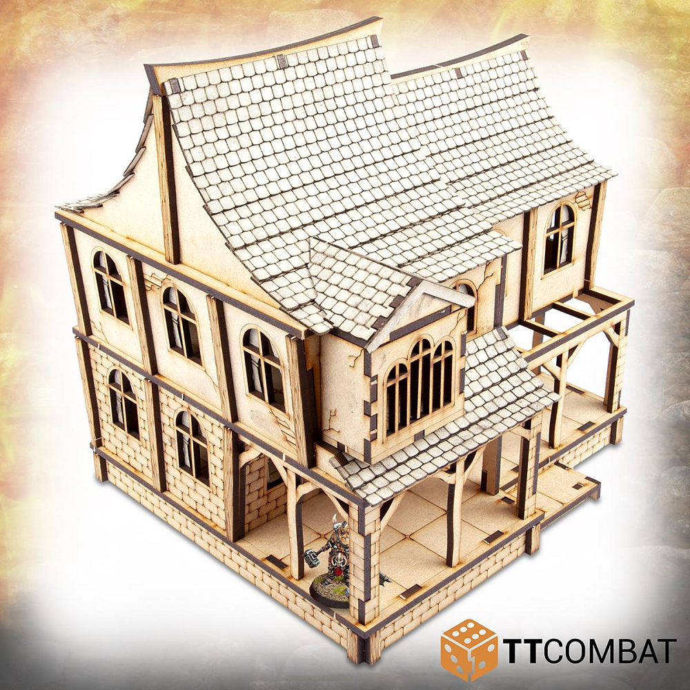 An MDF tavern for your gaming table from TT Combat. This kit lets you build a steep pitched roofed and angled wall tavern in which each section can be removed and the interior is fully playable.