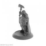 Balzador from the Dark Heaven Legends metal range by Reaper Miniatures sculpted by Bob Ridolfi. A male human cleric holding a shield in one hand and a hammer in the other, wearing full plate armour and a cloak