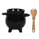 black cauldron egg cup and broom spoon