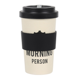 travel mug in a cream colour with an upside down bat and the words 'Not a morning person' written in black, topped with a black lid.