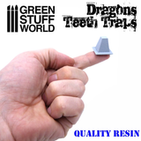 Resin Dragon Teeth Tank Traps by Green Stuff World on a finger