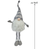 Grey Christmas gonk. posable grey stripe hat featuring snowflake design topped with a grey star, white beard, posable knitted striped arms, nose poking out 