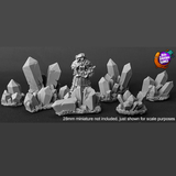 Crystals by Bad Squiddo Games contains 8 pieces of lovely sculpted resin crystals shown with human mini