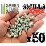 Resin Ork Skulls by Green Stuff World in a hand