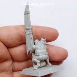 Sheol-morg Asgrak v.1 by Spellcrow is a resin miniature by Spellcrow. This minotaur holding a gigantic sword with a slightly disgruntled look on its face, a loin cloth as clothing shown here held in the hand
