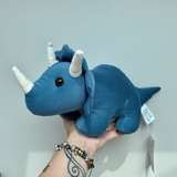 Triceratops Door Stop Plush in hand