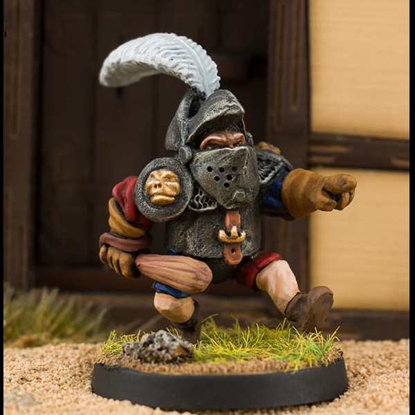 Commander Boots by Northumbrian Tin Solider is an old school style metal miniature for your gaming table holding a club in one hand and pointing with the other