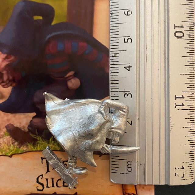 The Slicer by Northumbrian Tin Solider will look great sneaking about on your gaming table, with his cloak hood up, in a running stance with a knife in hand with ruler