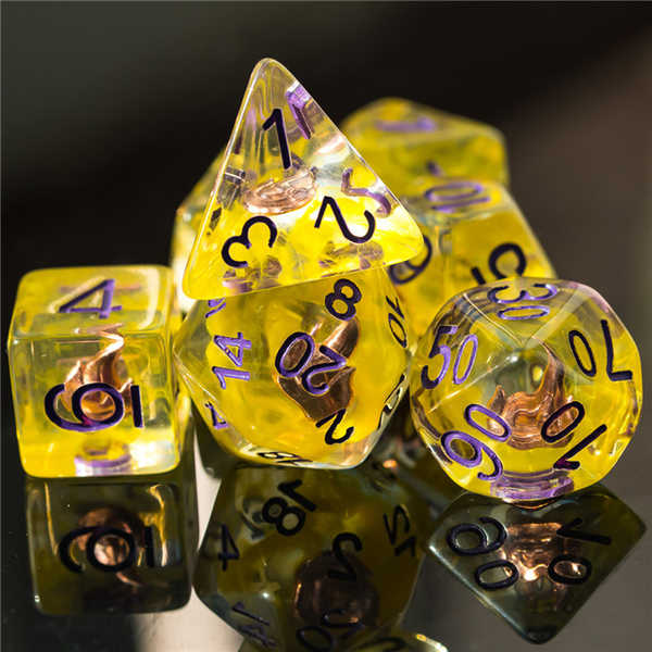 RPG Character class dice, sorcerer, these yellow colour swirl character class dice have purple numbers and contain a copper fire symbol.