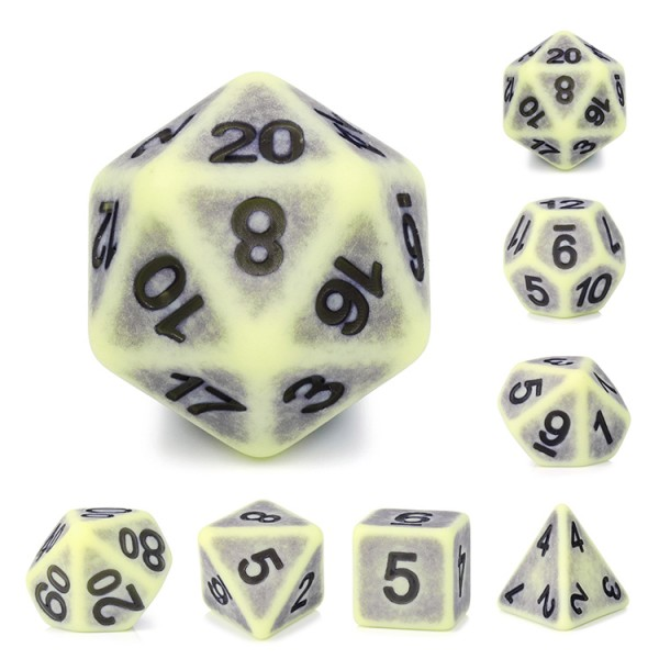 Weathered ancient Yellow Apatite RPG dice set. A set of pale yellow coloured dice with black numbers. RPG D20 dice set